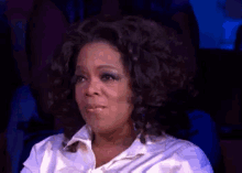 Black woman nodding and holding back tears GIF Oprah Winfrey The Oprah Winfrey Show