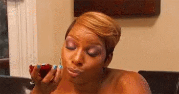 Black woman rolling eyes with mobile GIF Nene Leakes The Real Housewives of Atlanta
